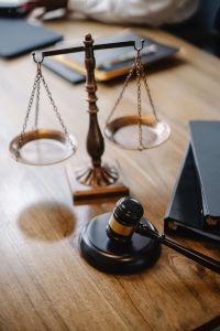 A pair of scales and a gavel in the office of a Bakersfield wrongful death lawyer