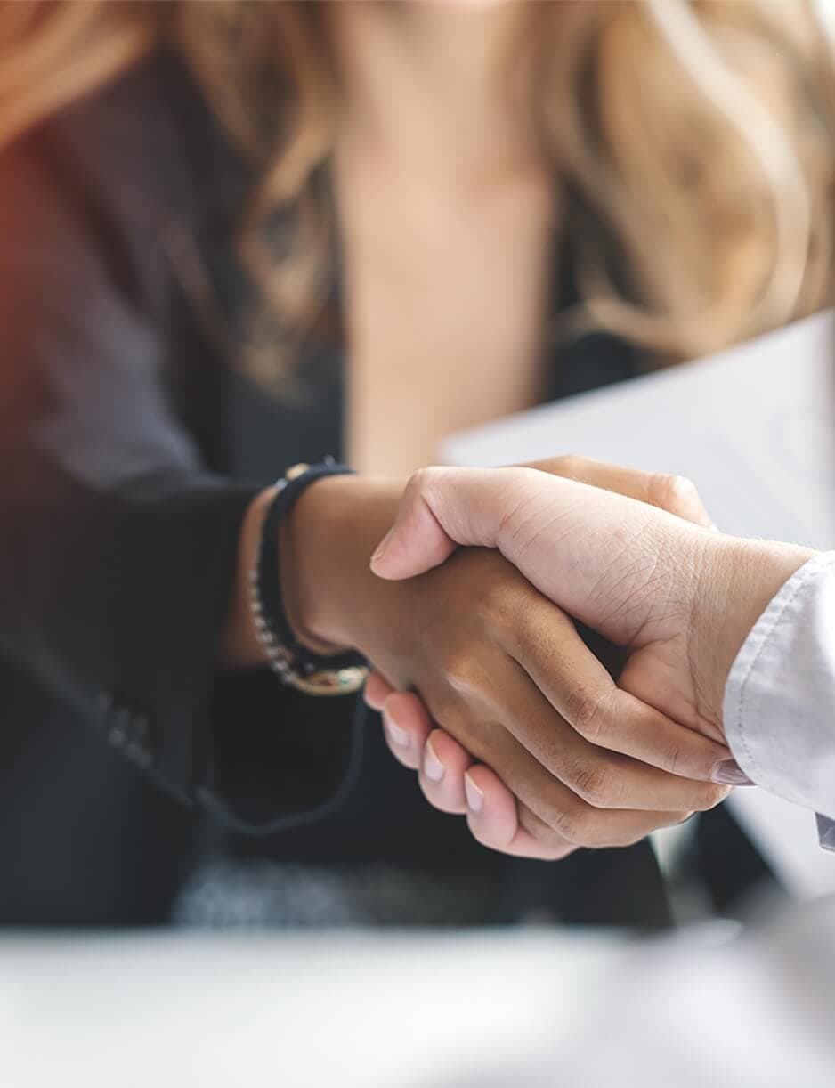 man and woman shaking hands